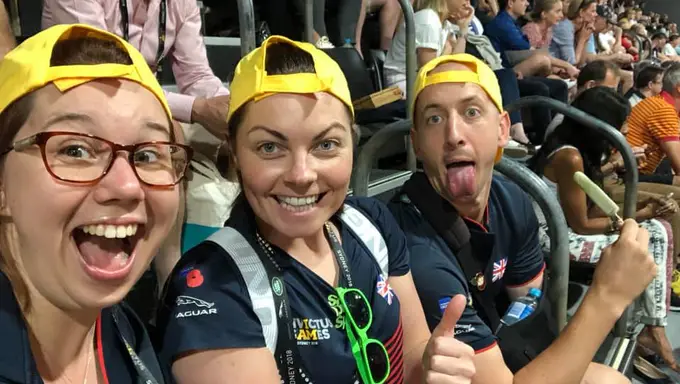 Joe and Megan cheering on competitors at the Invictus Games