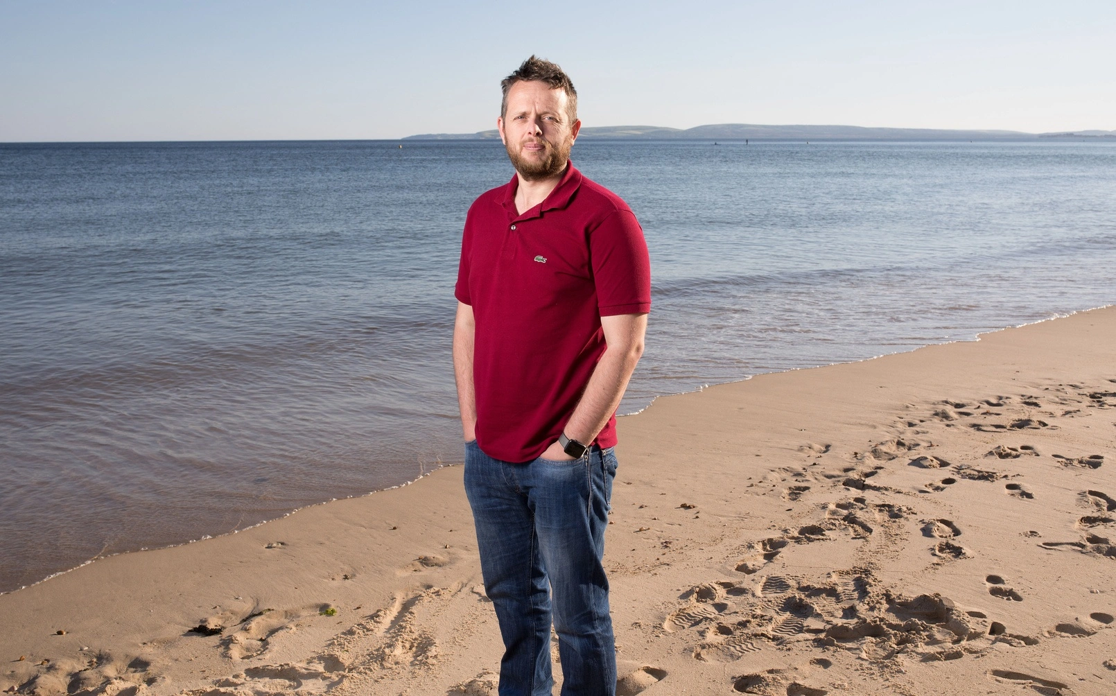 Mike Kiff standing on the beach