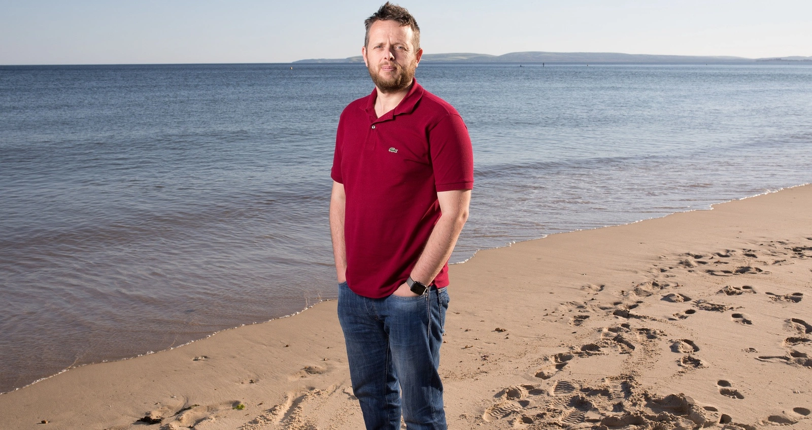 stories_mikekiff_beach Mike Kiff standing on the beach