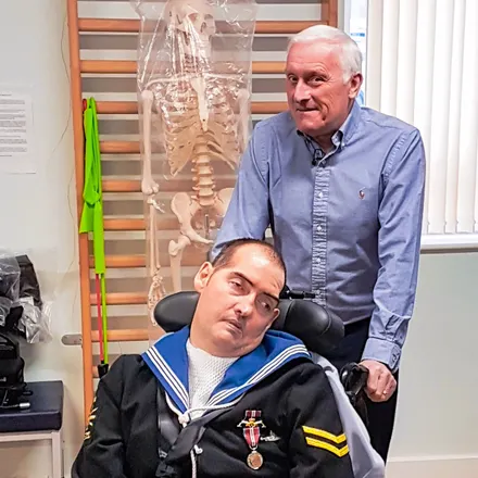 John and Paul Reynolds with the wheelchair that  the Legion and Navy helped pay for