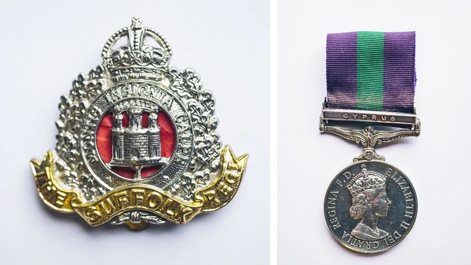 Peter Cherry’s cap badge and his General Service Medal.