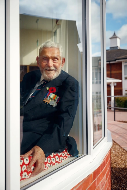 Ken Judd looking out of a window