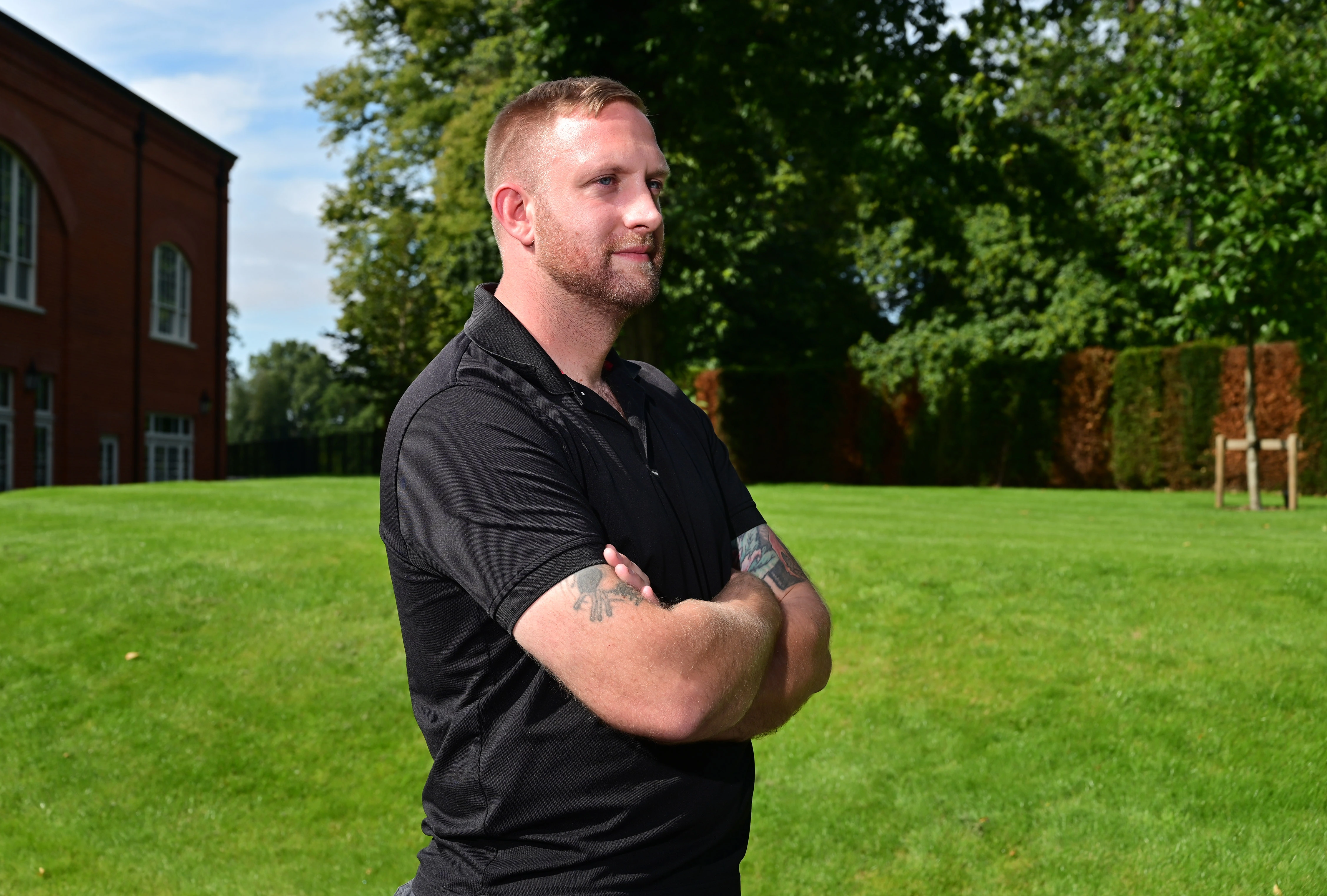 Andy Barlow standing in the grounds of DMRC