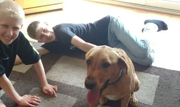 Jake with Autism assistance dog Rigby