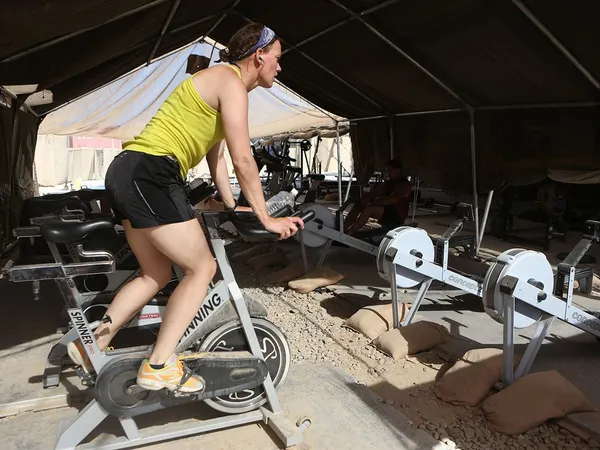 Anna Crossley working out in a basecamp gym in Afghanistan.