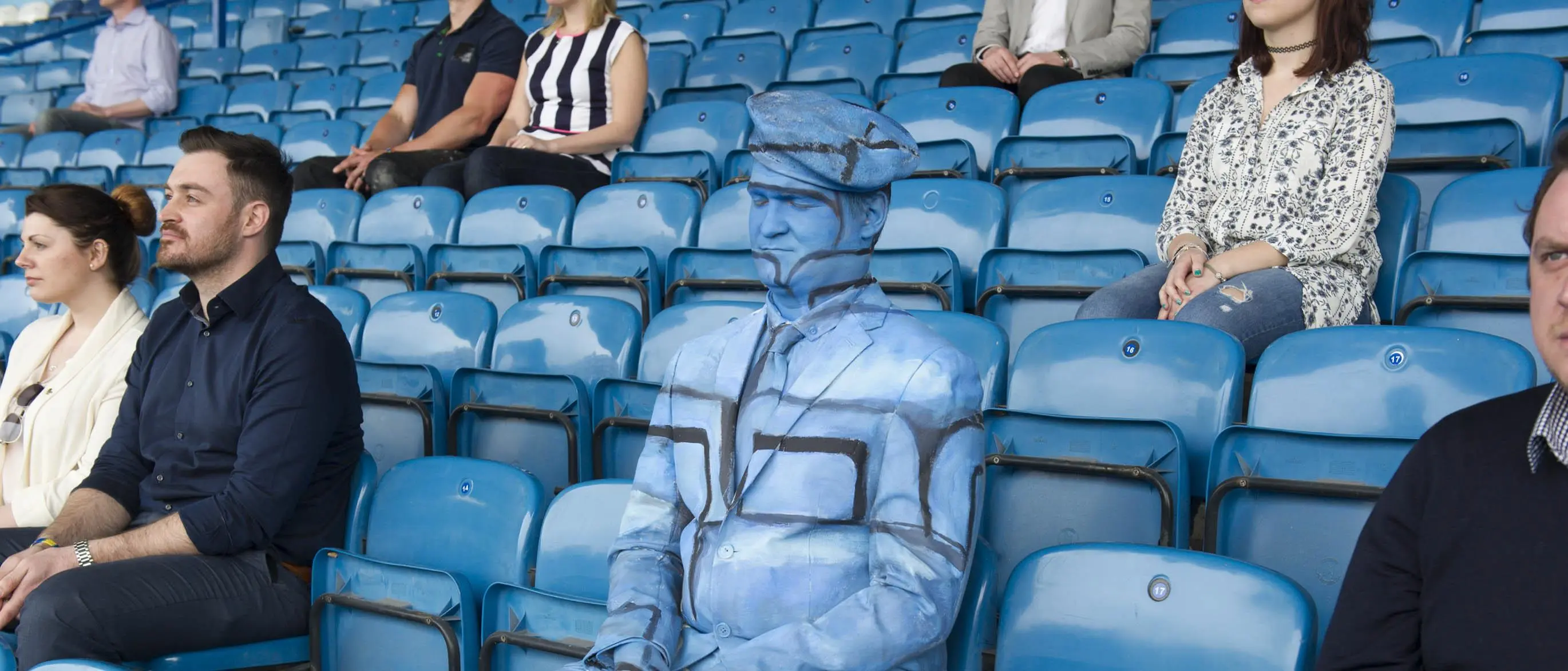 Veteran David Iveson painted in a football stadium
