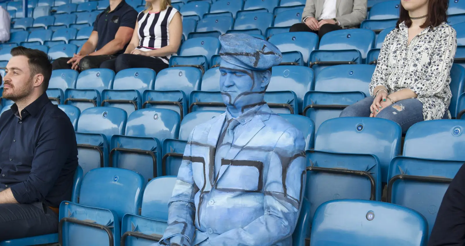 Veteran David Iveson painted in a football stadium