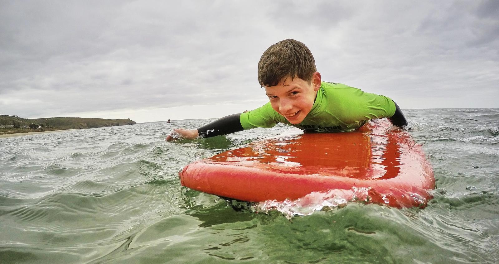 A child on a surfboard