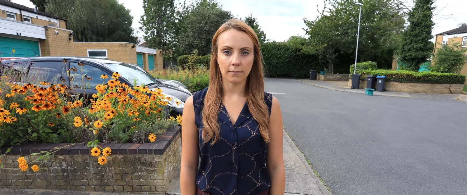 Victoria standing in a street