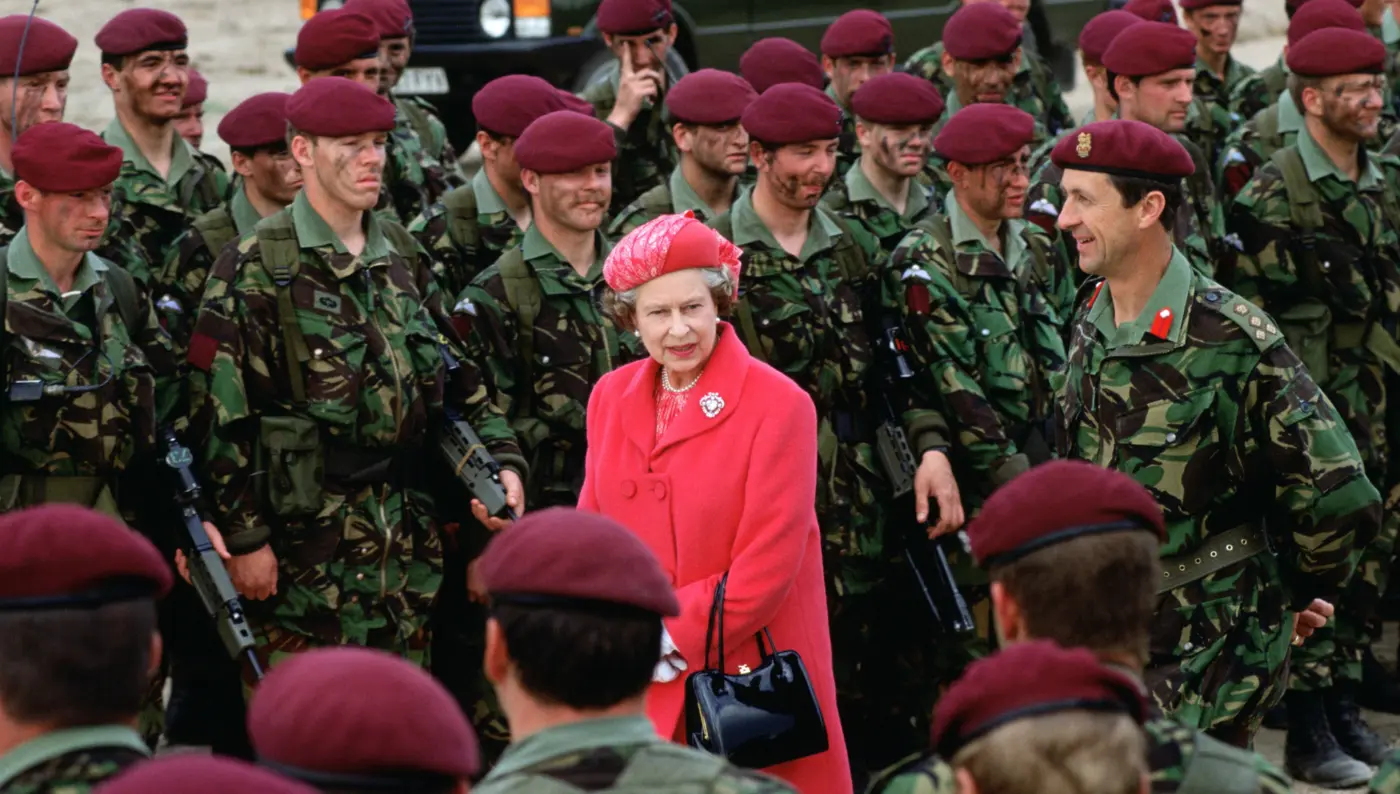 Her late Majesty The Queen with members of the British Army