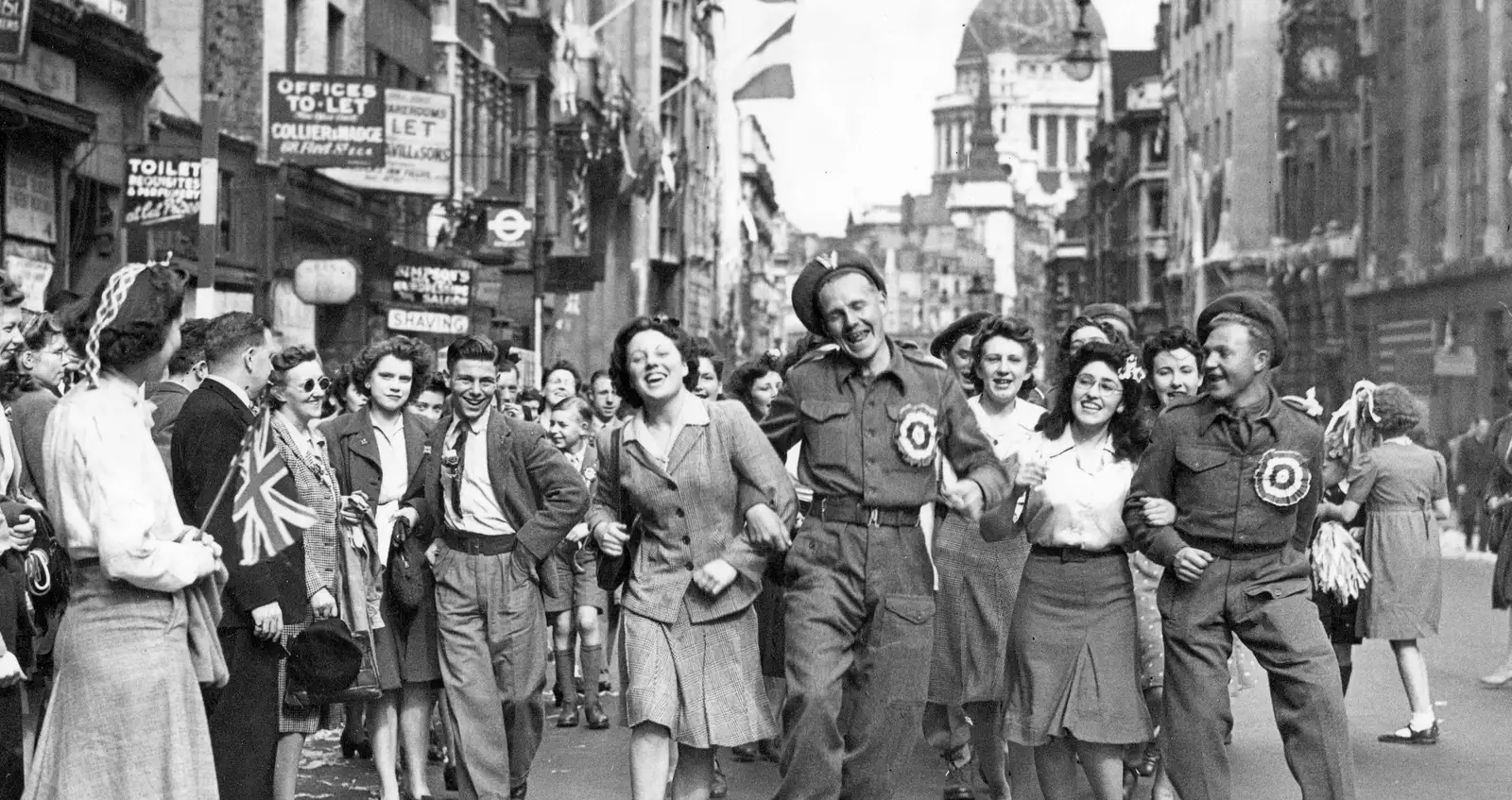 Servicemen join revellers as they party for VE Day in London - VE Day in London 1945 Servicemen join revellers as they party for VE Day in London - VE Day in London 1945