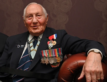 Mervyn wearing his military medals