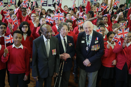 Mervyn with fellow veterans on a school visit