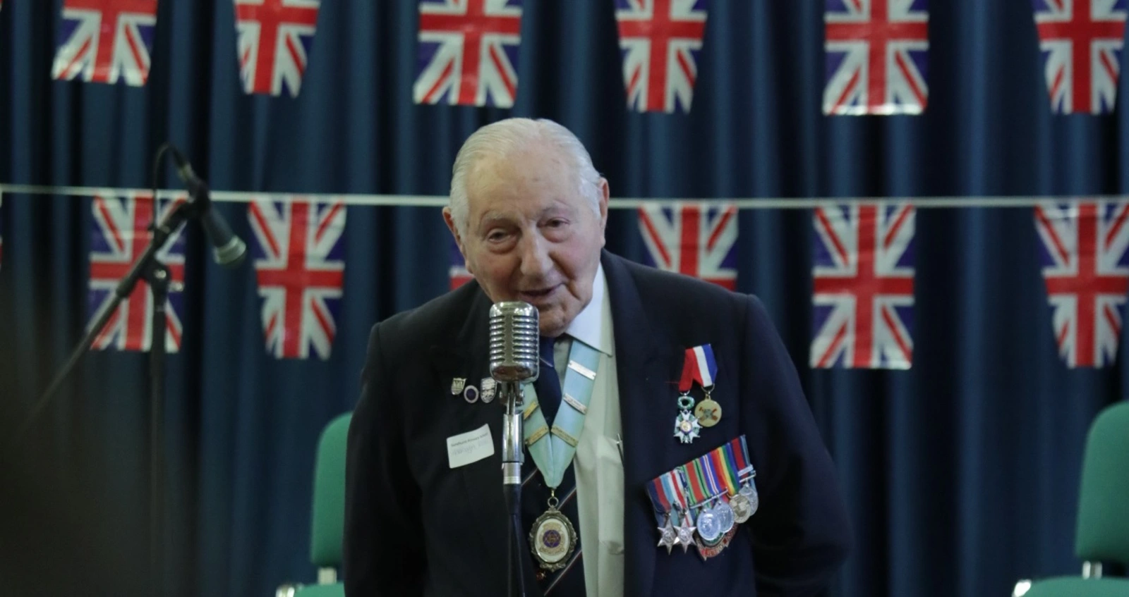WW2 veteran speaking at an event
