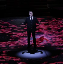 Tomos Roberts performing his poem Alive With Poppies at the Festival of Remembrance in 2021