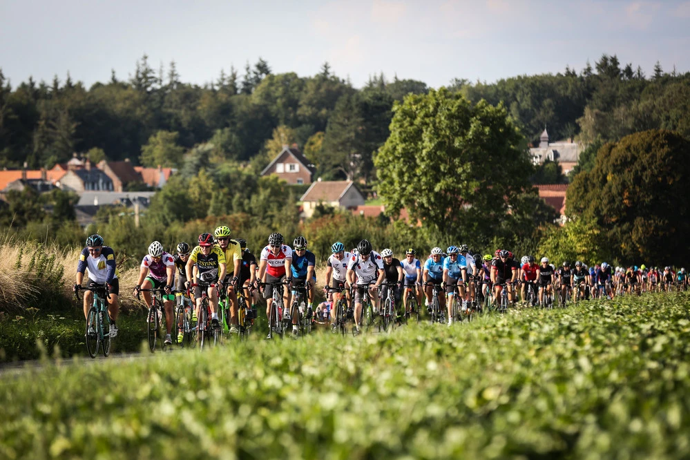 A group of cyclists riding through France