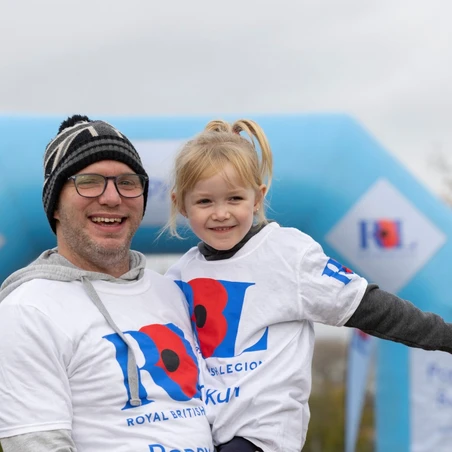 Father and daughter at the Poppy Run finish line