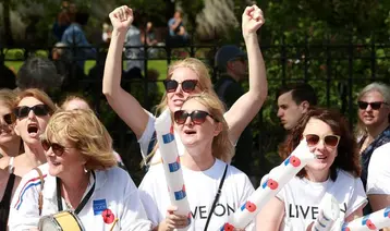 Volunteers cheering on Legion fundraisers