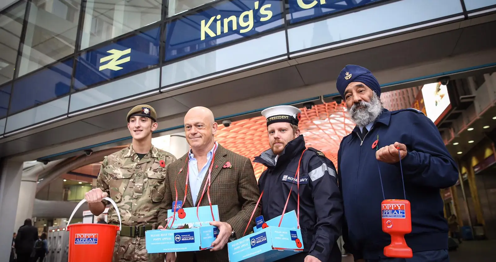 Ross Kemp with poppy collectors